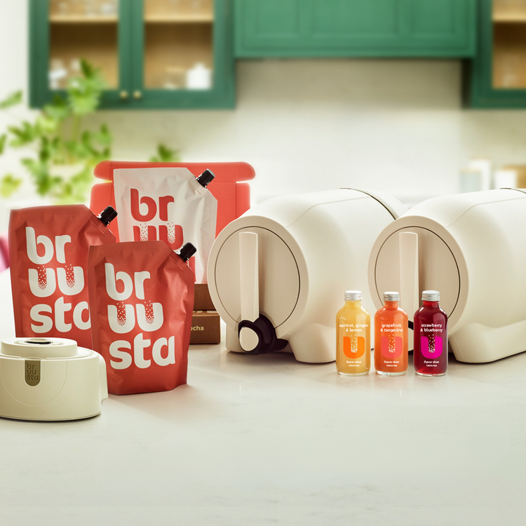 Complete kombucha home brewing kit on kitchen counter including the Bruusta brewing device for making kombucha easily at home